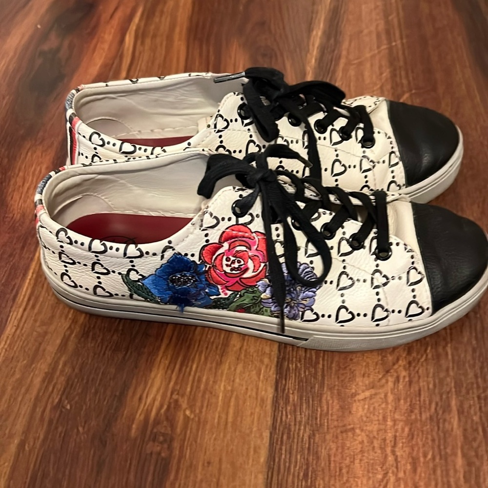 Brighton embroidered lace up sneakers.